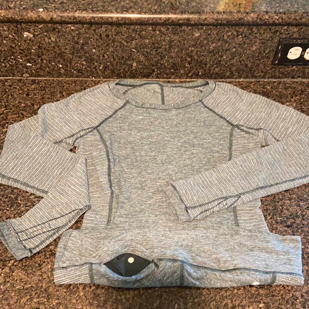 Lululemon Stretch long sleeved. Size 4 fit like a 6 w/ elastin. Soft and comfy.